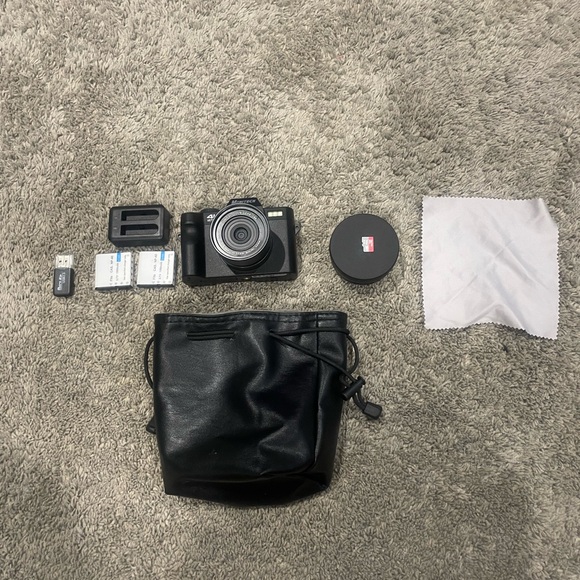 Other - Camera barely used comes with two batteries,sd card,usb,extra lens with bag